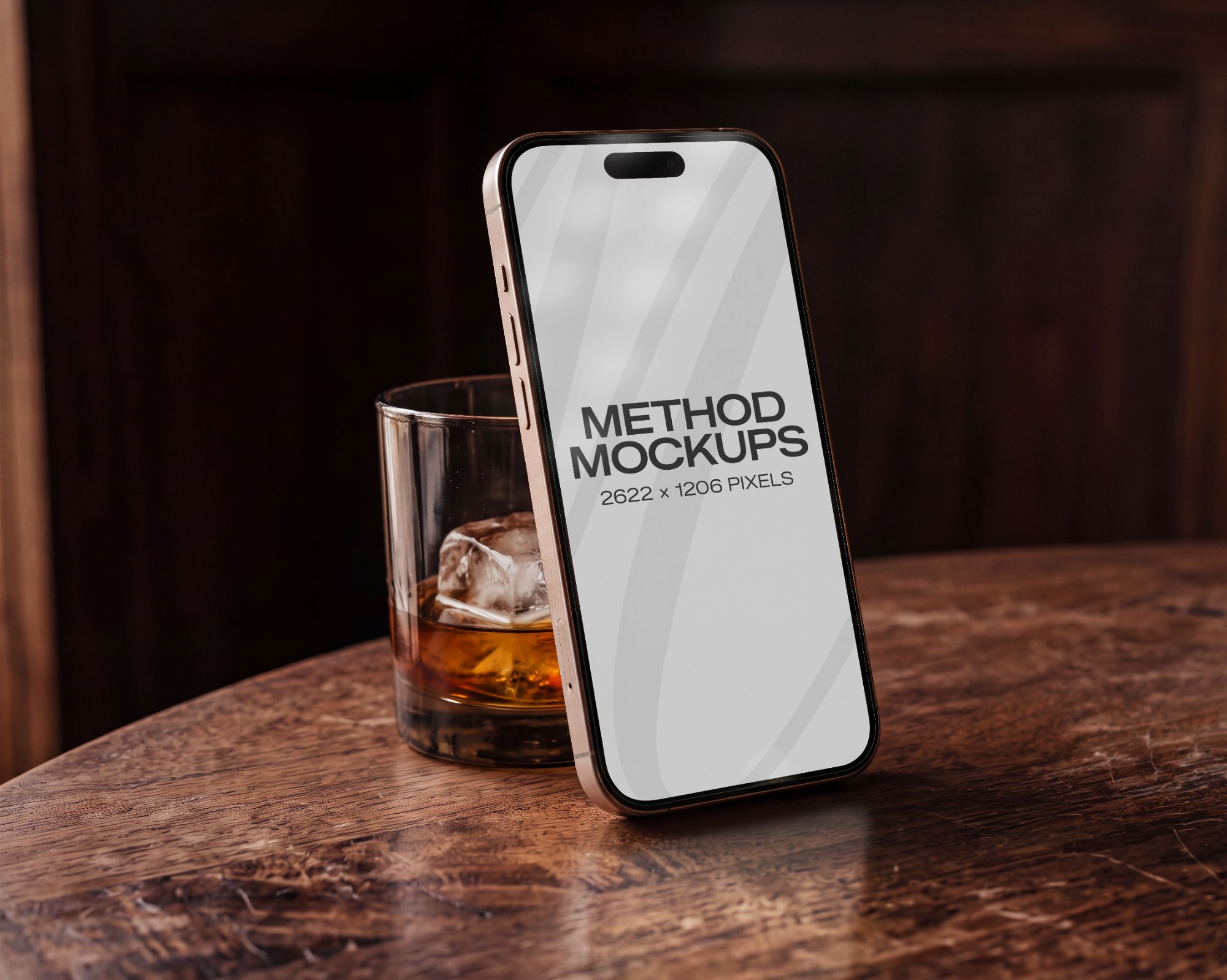 Phone Mockup Beside a Whiskey Glass